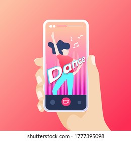 Hand Holding Smartphone Recording A Dance Video In The Application.