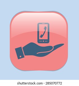 hand holding a smartphone with the symbol telephone handset
