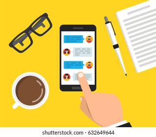 Hand holding smartphone with text messaging on the screen. ?up of coffee, notebook with pen and glasses lay on the table. Vector flat illustration.
