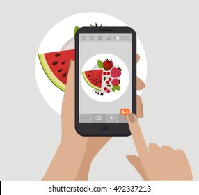 Hand holding smartphone touching screen and taking food photography for social network. 