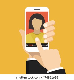 Hand holding smartphone with video online training on the screen. Vector flat illustration.