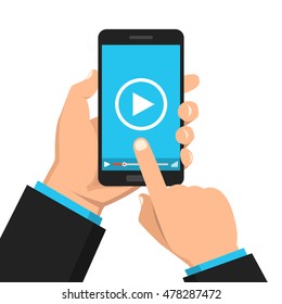 Hand holding smartphone with video player on the screen. Movie app concept. Vector flat illustration.