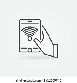 Hand holding Smartphone with Wi-Fi vector outline icon or sign