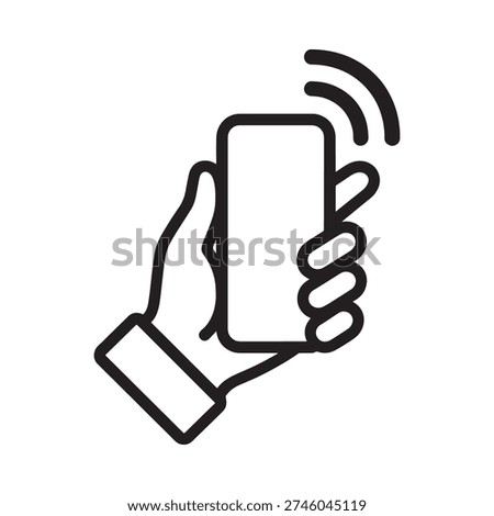 Hand holding smartphone with wireless signal waves emanating from screen