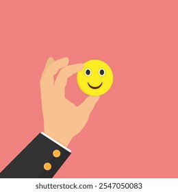 Uma mão segurando um rosto emoji sorridente contra um fundo rosa. O conceito destaca o valor de manter um comportamento amigável e feliz nas interações com os clientes