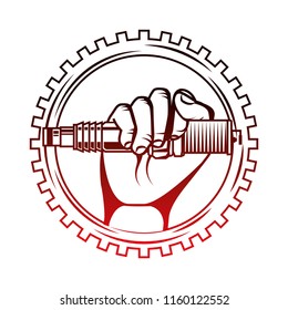 hand holding spark plug spare part industry automotive