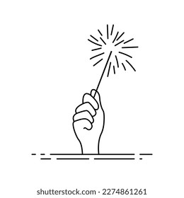 Hand holding a sparkling sparkler