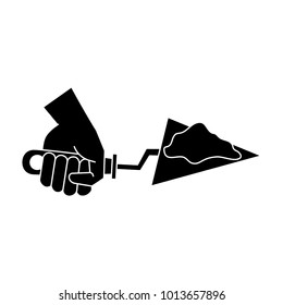Hand holding spatula