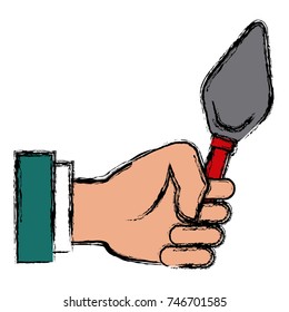Hand holding spatula