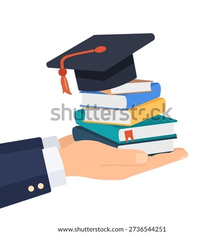Hand holding stack of books with graduation cap. World book day