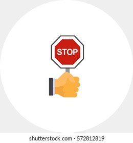 Hand Holding Stop Sign