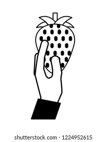 hand holding strawberry