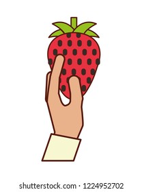 hand holding strawberry