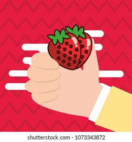 hand holding strawberry fresh colored background