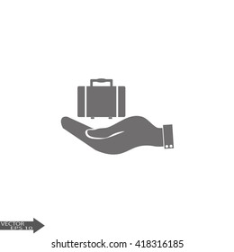hand holding a suitcase for travel. Travel Bag