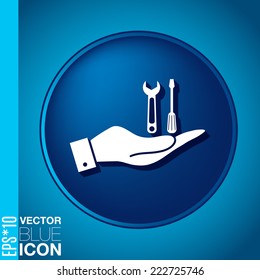 hand holding a symbol settings sign, screwdriver and wrench