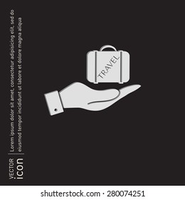 hand holding a symbol of a suitcase for travel. Travel Bag
