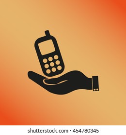 hand holding with the symbol telephone