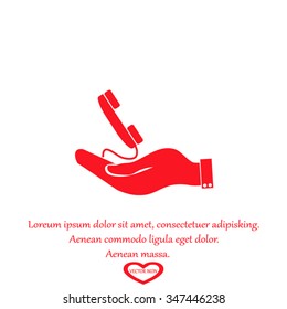 hand holding  with the symbol telephone handset