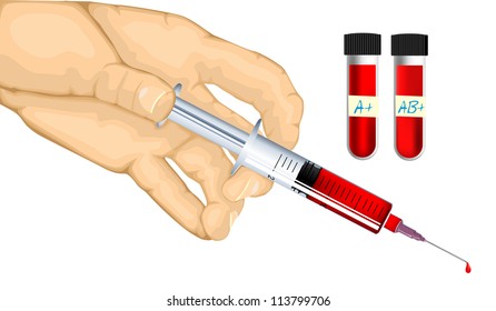 Hand holding syringe