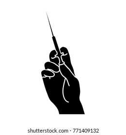 Hand holding a syringe vector icon. Flat design style