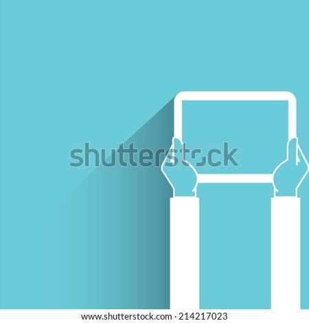 hand holding tablet on blue background