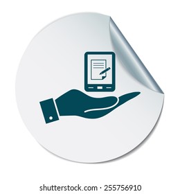hand holding a tablet pad with sheet of paper.