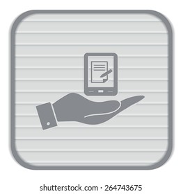 hand holding a tablet pad with sheet of paper.