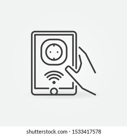 Hand holding tablet with smart socket vector outline icon
