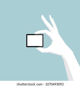 Hand holding tablet, hand is white.tablet is black.