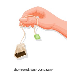 Hand holding tea bag, healthy drink product cartoon illustration vector