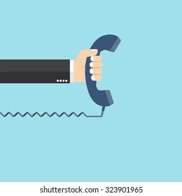 Hand holding telephone. Communication design template. old telephone. flat design. vector illustration