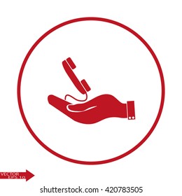 hand holding telephone handset icon
