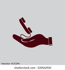 hand holding telephone handset icon