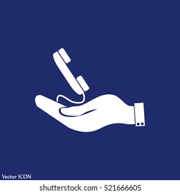 hand holding telephone handset icon