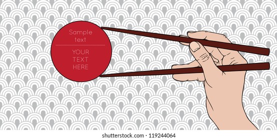 Hand holding text box by chopsticks