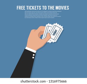 Hand holding tickets