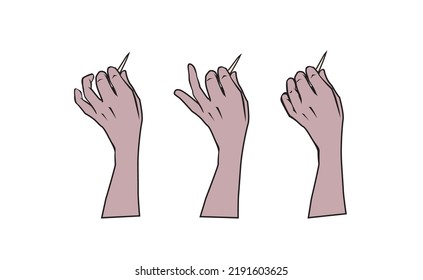 eine Hand, die einen Zahnstocher hält