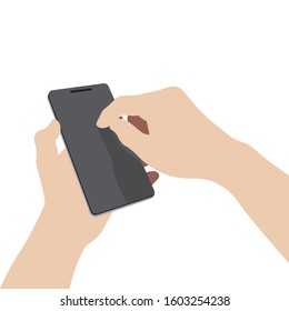 Hand holding and touching the screen of a mobile phone