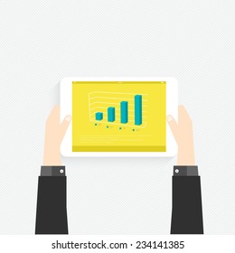 Hand holding a touchpad pc (tablet) with graphic