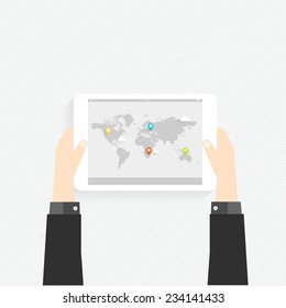 Hand holding a touchpad pc (tablet) with graphic map