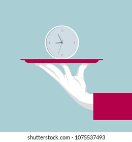 Hand holding tray, Clock symbol in the tray.