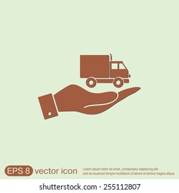 hand holding a Truck. Logistic icon. Transportation symbol. symbol icon laden truck. carriage of the goods or things