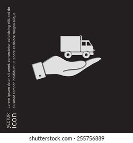 hand holding a Truck. Logistic icon. Transportation symbol. symbol icon laden truck. carriage of the goods or things