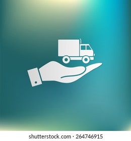 hand holding a Truck. Logistic icon. Transportation symbol. symbol icon laden truck. carriage of the goods or things