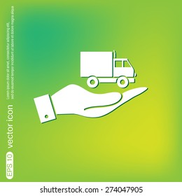 hand holding a Truck. Logistic icon. Transportation symbol. symbol icon laden truck. carriage of the goods or things