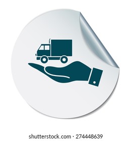 hand holding a Truck. Logistic icon. Transportation symbol. symbol icon laden truck. carriage of the goods or things