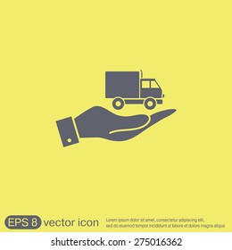 hand holding a Truck. Logistic icon. Transportation symbol. symbol icon laden truck. carriage of the goods or things