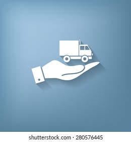 hand holding a Truck. Logistic icon. Transportation symbol. symbol icon laden truck. carriage of the goods or things