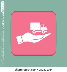 hand holding a Truck. Logistic icon. Transportation symbol. symbol icon laden truck. carriage of the goods or things